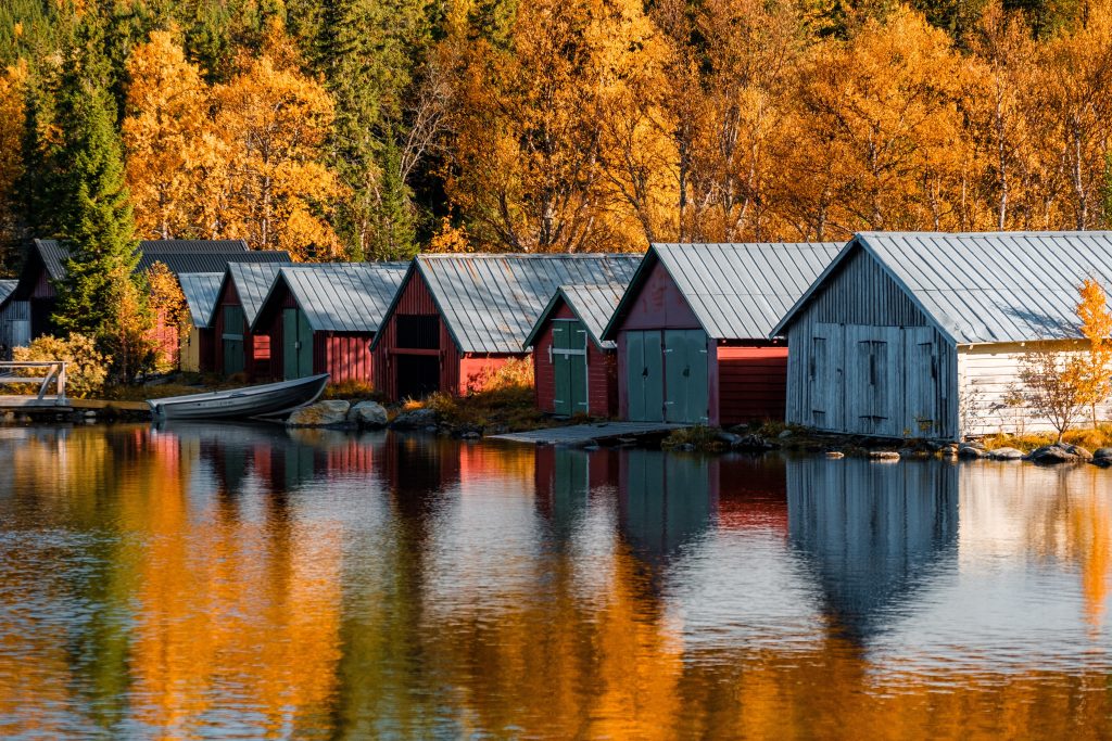 Beautiful shot of boathouses in autumn