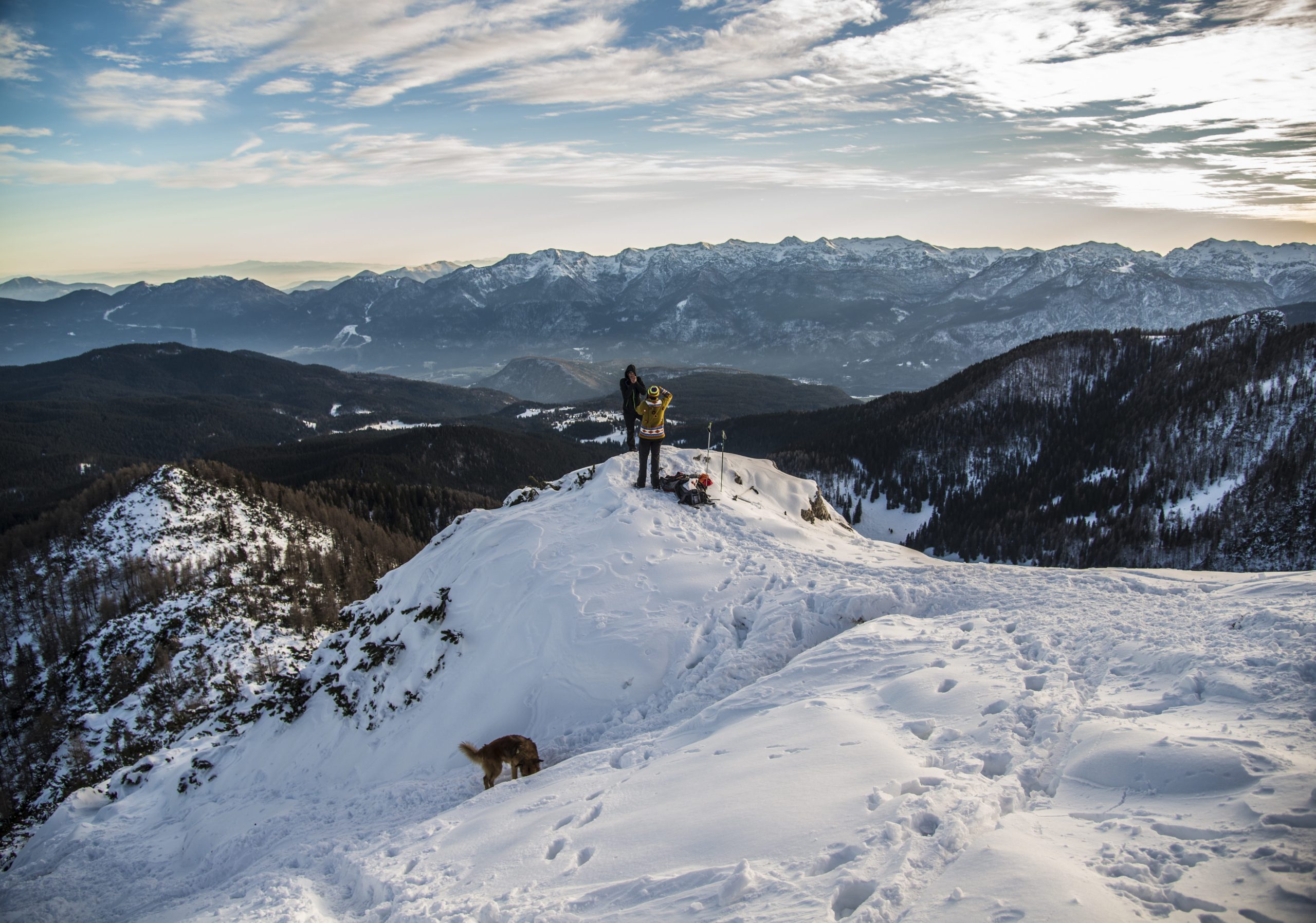 climbers-top-snowy-mountain